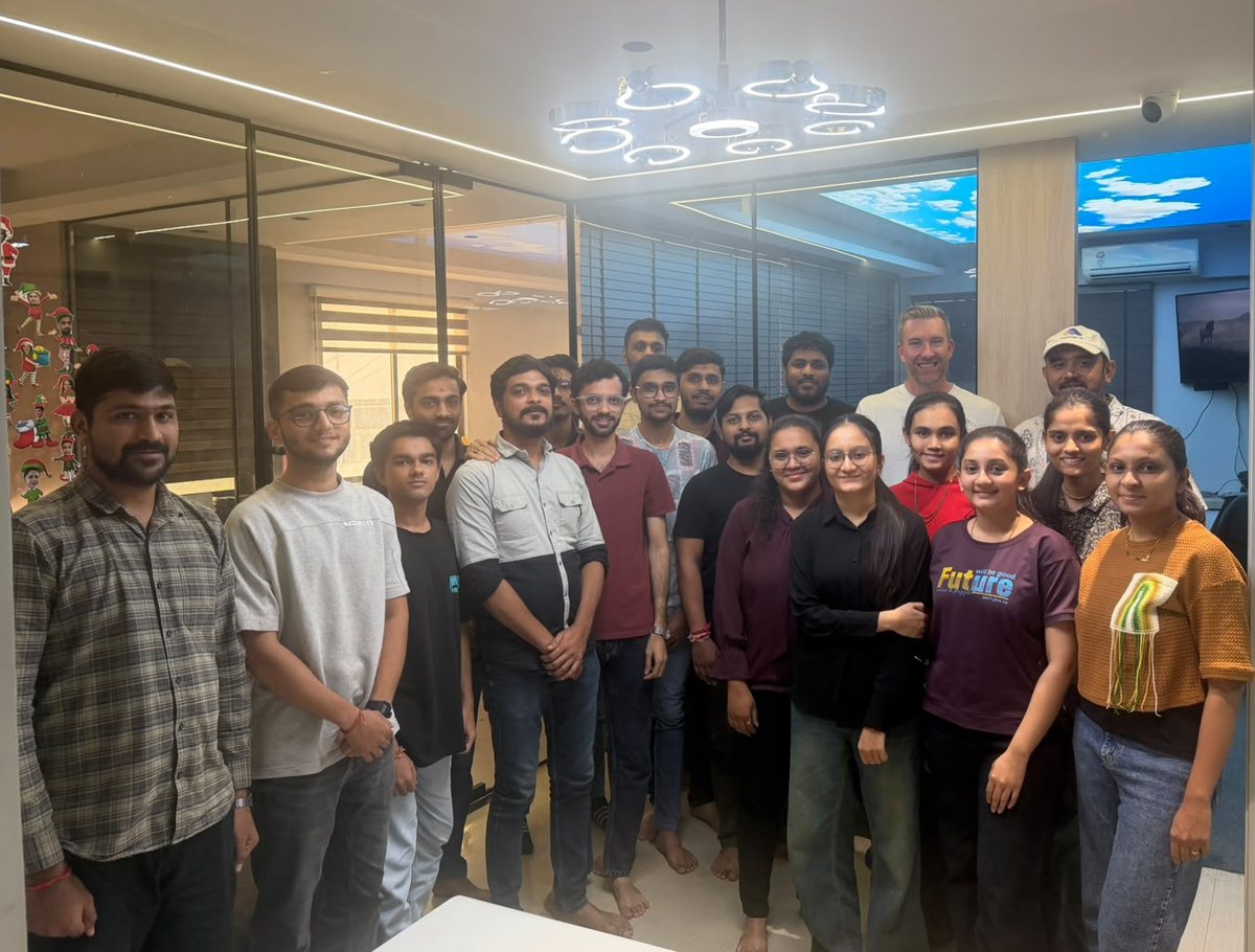 Arthur with the engineering team in the office